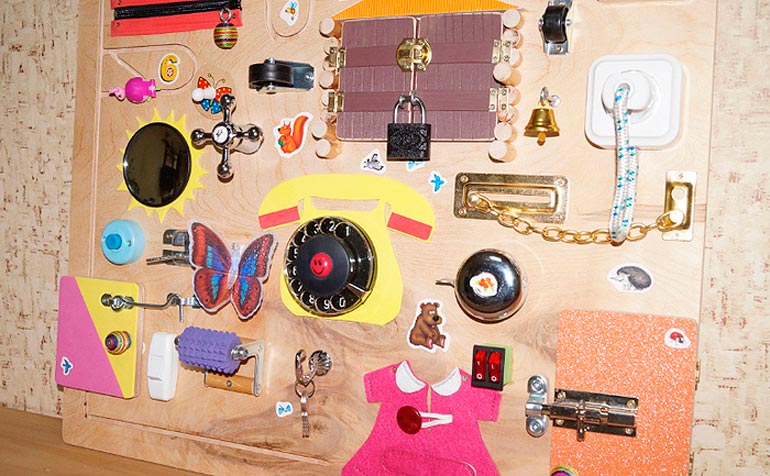 Бизиборд своими руками — развивающая доска с замочками и кнопочками (фото, мастер-класс)